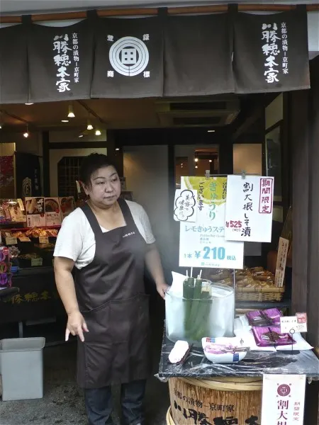 souvenir pickles on a stick street vendor Sannenzaka and Ninenzaka shopping streets kyoto oldest