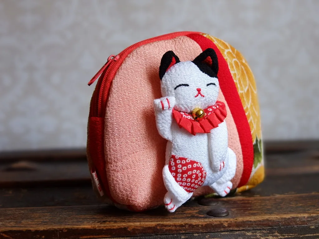 Japan Kyoto silk pouch lucky cat from craft shop in Arashiyama souvenir shopping