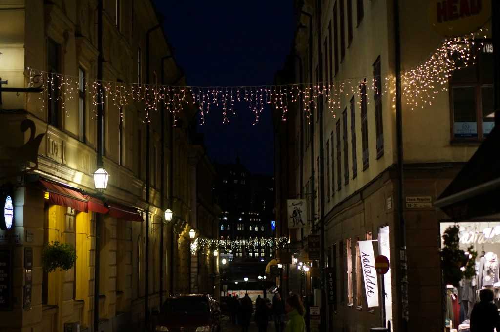 Christmas lights  Gamla Stan Stockholm cobblestone street night 