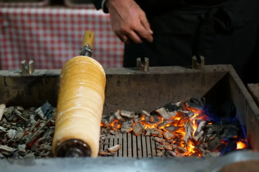 A real chimney cake is mixed and rolled to order, then cooked over hot coals and finished with cinammon sugar.