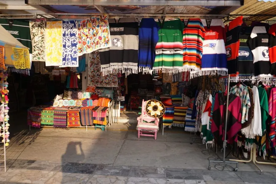 Shopping for souvenirs at the colorful La Ciudadela market in Mexico City. photos