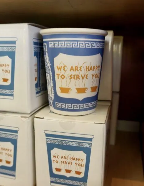 Ceramic New York Coffee Cup with Slogan We are happy to serve you